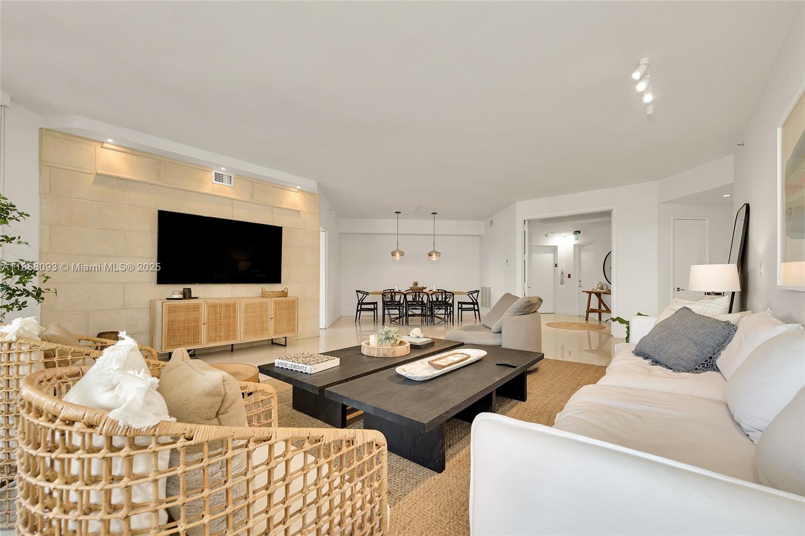 Village of Key Biscayne Key Biscayne, FL 33149 - Photo 5 of 24 a living room with furniture and a flat screen tv