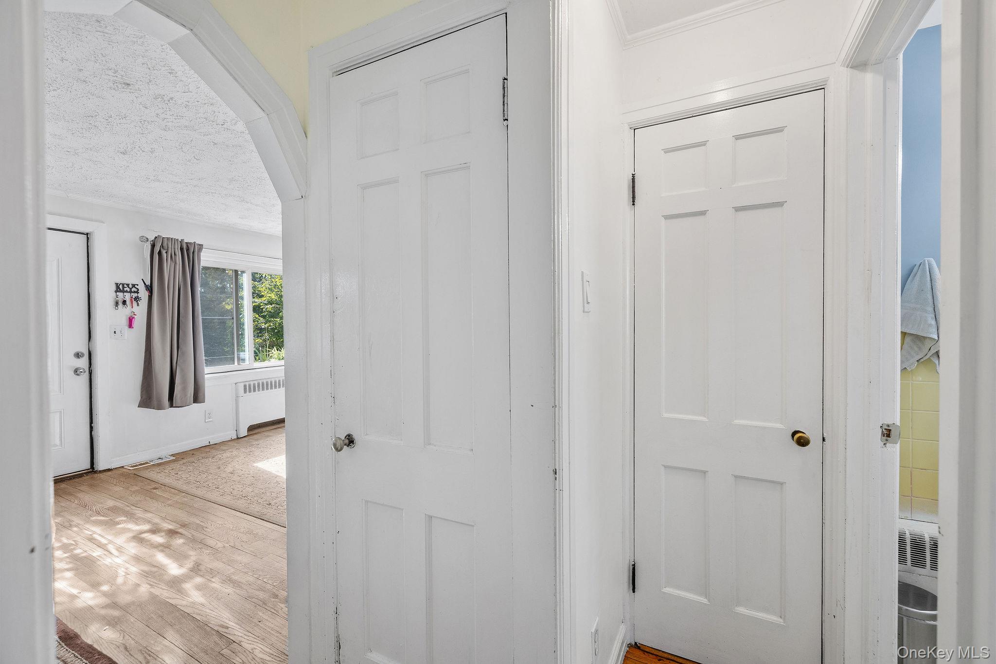 2 Tuxedo Road Carmel, NY 10512 - Photo 15 of 25 a view of a hallway with wooden floor and a bathroom