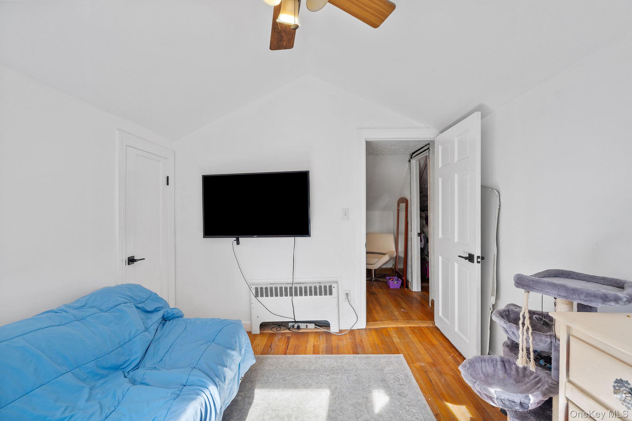 2 Tuxedo Road Carmel, NY 10512 - Photo 19 of 25 a living room with furniture and a flat screen tv