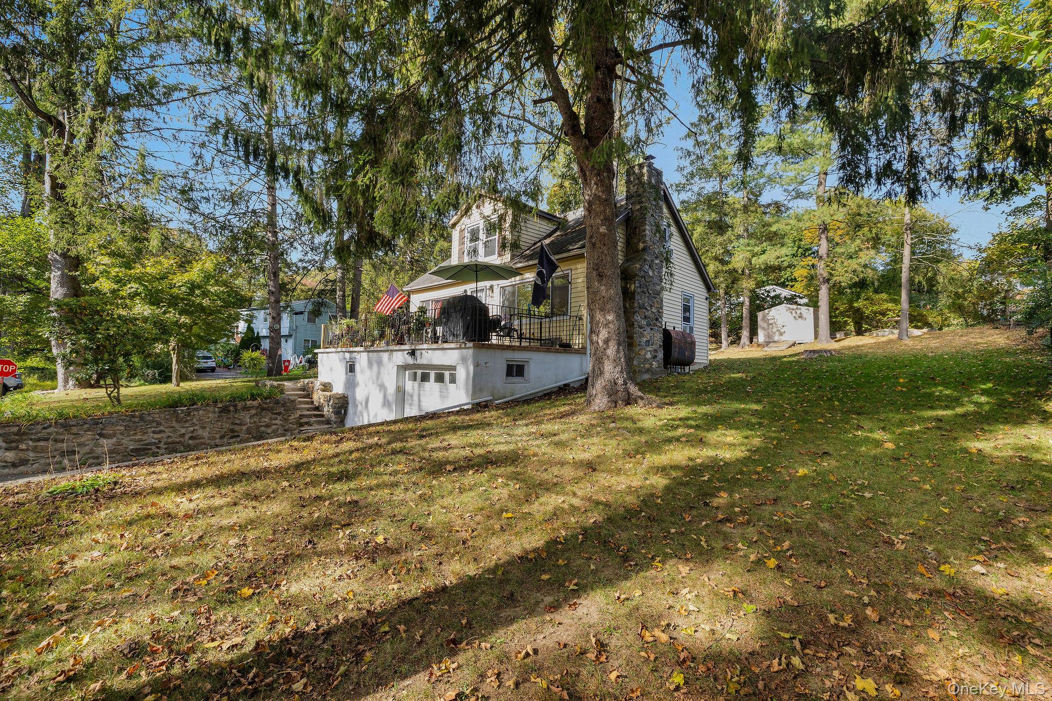 2 Tuxedo Road Carmel, NY 10512 - Photo 21 of 25 a view of a house with a yard