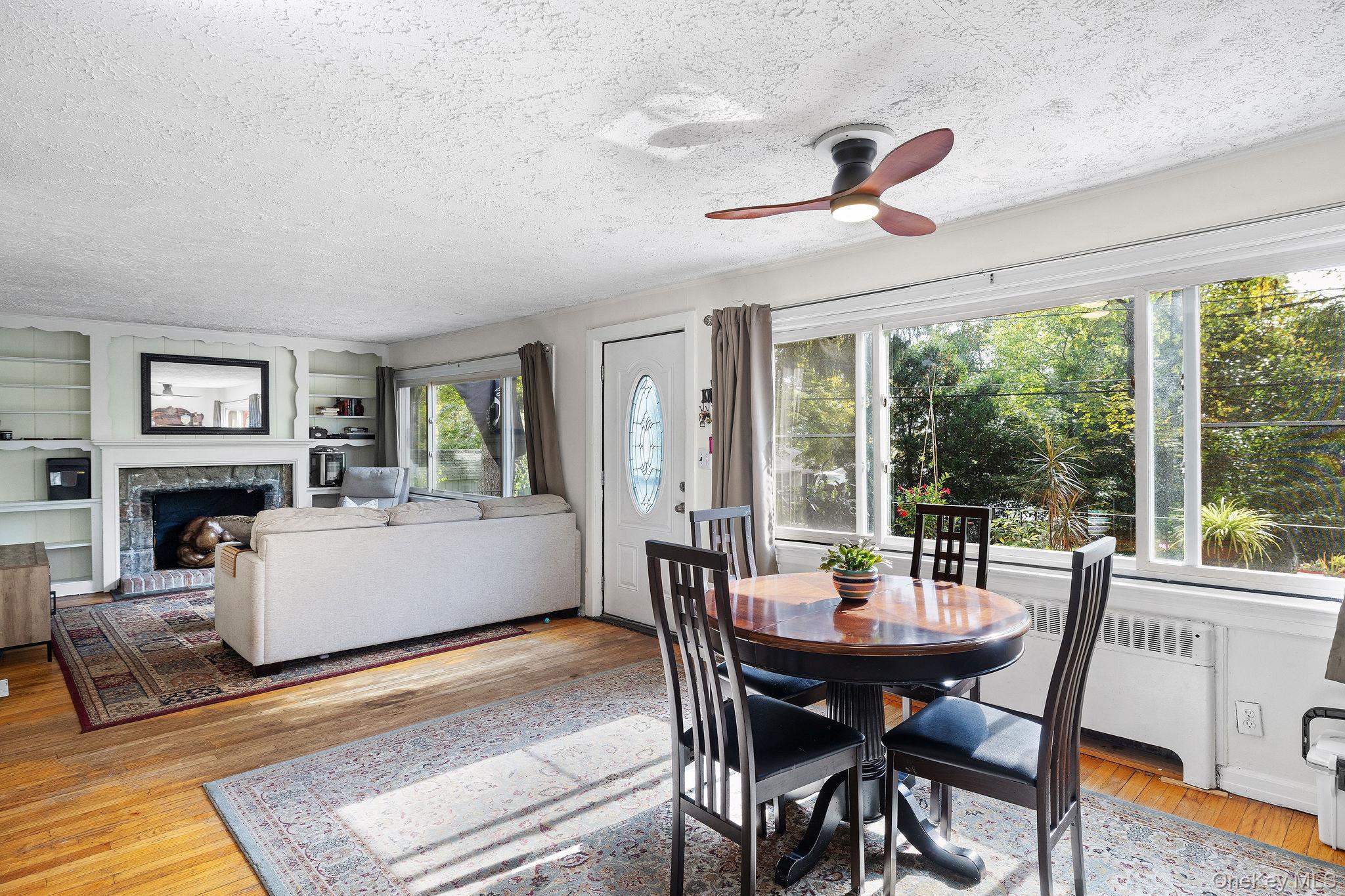 2 Tuxedo Road Carmel, NY 10512 - Photo 7 of 25 a view of a dining room with furniture window and wooden floor