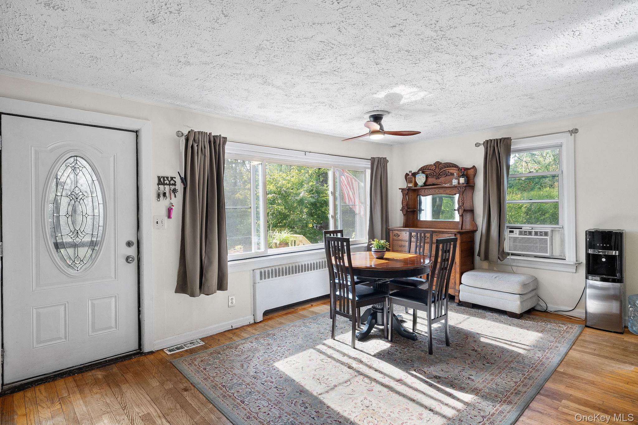 2 Tuxedo Road Carmel, NY 10512 - Photo 10 of 25 a living room with furniture a window and a table