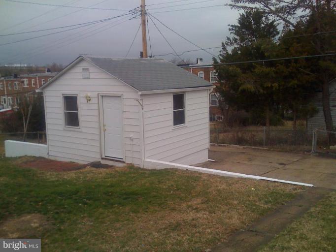 206 West Hilltop Road Brooklyn, MD 21225 - Photo 2 of 15 Heat Shed and large parking area