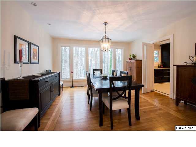 1872 Field Road Charlottesville, VA 22903 - Photo 4 of 29 Dining room with windows overlooking an expansive backyard and rear patio.