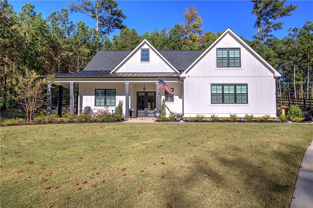 front view of a house with a yard