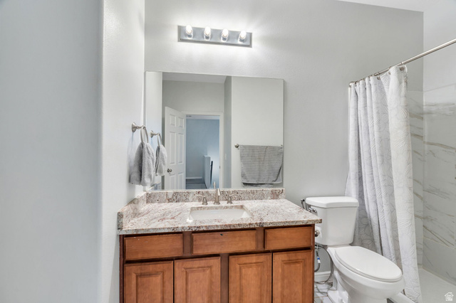 11007 Birch Creek Road South Jordan, UT 84095 - Photo 18 of 35 Large walk-in shower & rich cabinetry