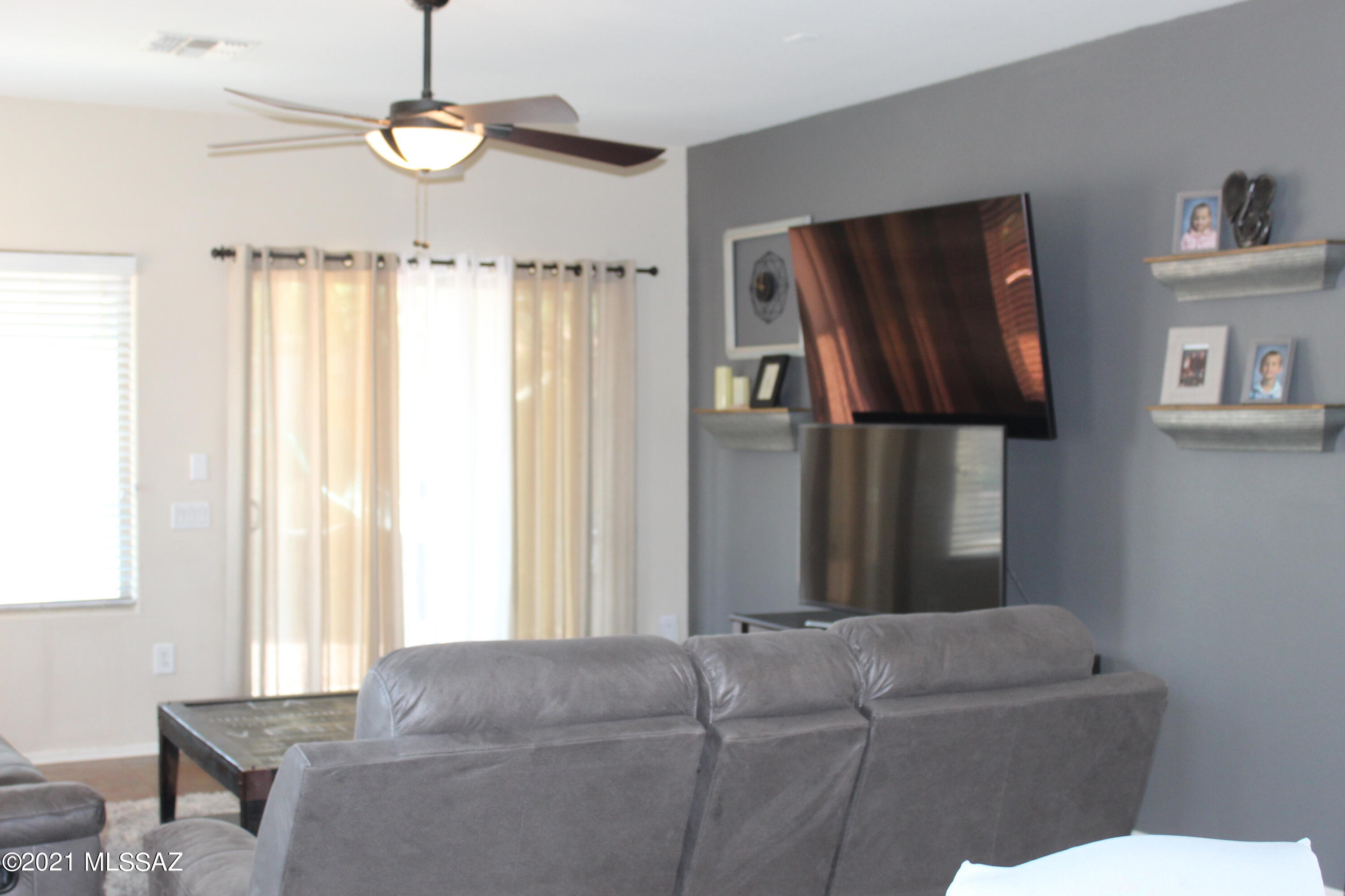 20951 East Reunion Road Red Rock, AZ 85145 - Photo 12 of 35 a living room with furniture and a window