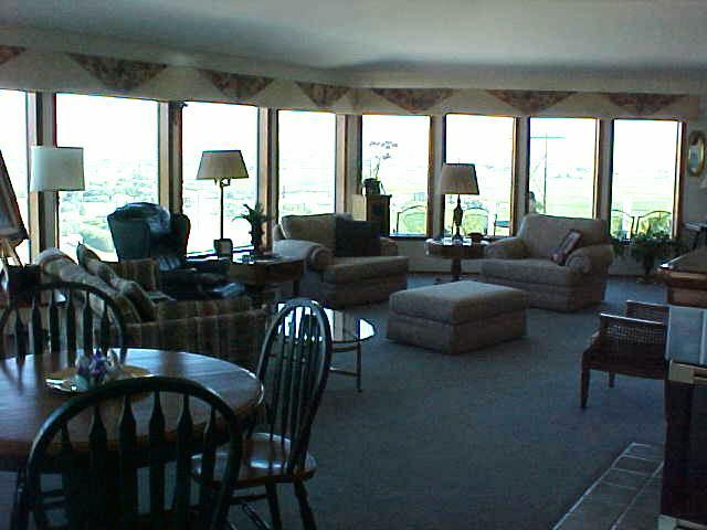 400 Alps Road Moxee, WA 98936 - Photo 5 of 9 a living room with furniture and floor to ceiling windows