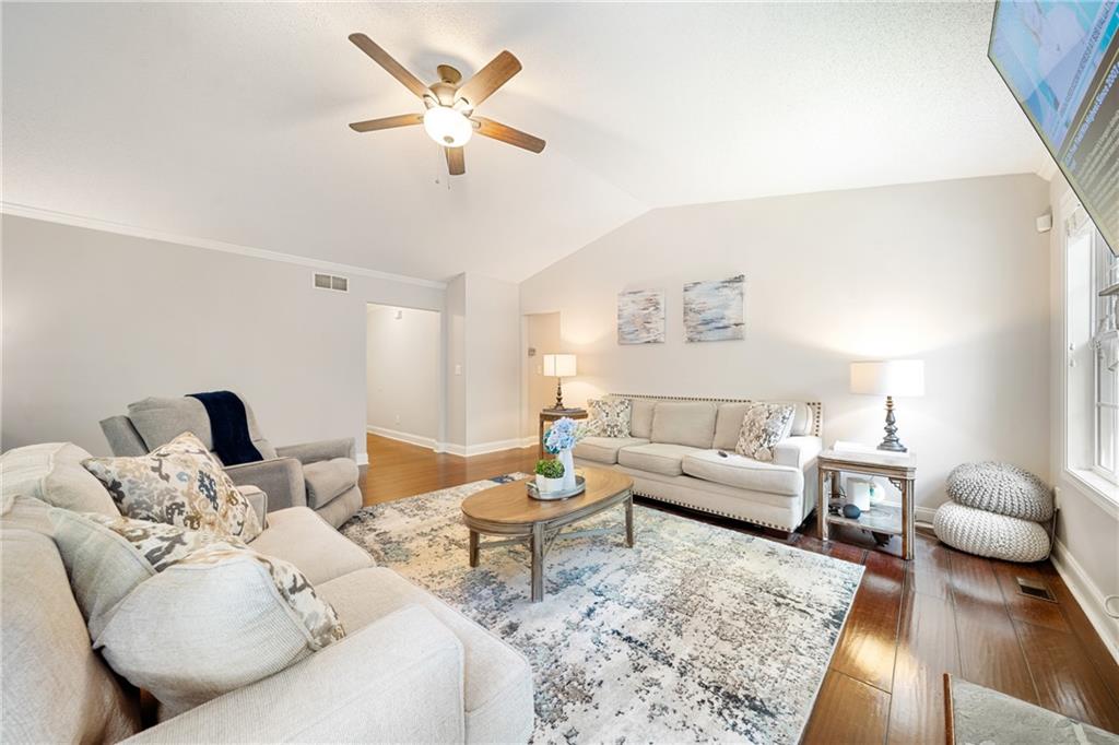 921 Pace Road Hiram, GA 30141 - Photo 6 of 41 a living room with furniture or couch and a rug