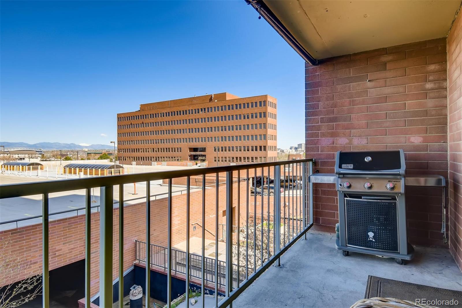 1301 Speer Boulevard, Unit 403 Denver, CO 80204 - Photo 11 of 26 a view of balcony with a fireplace
