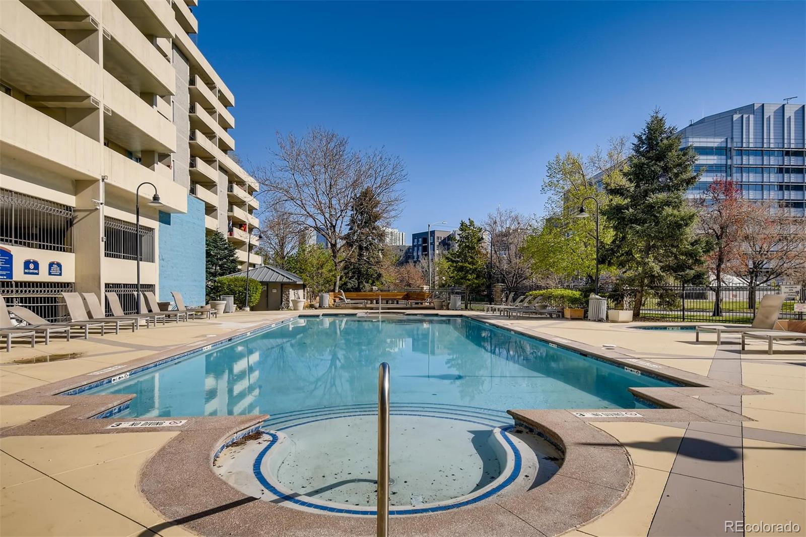 1301 Speer Boulevard, Unit 403 Denver, CO 80204 - Photo 22 of 26 a view of a swimming pool with a outdoor space