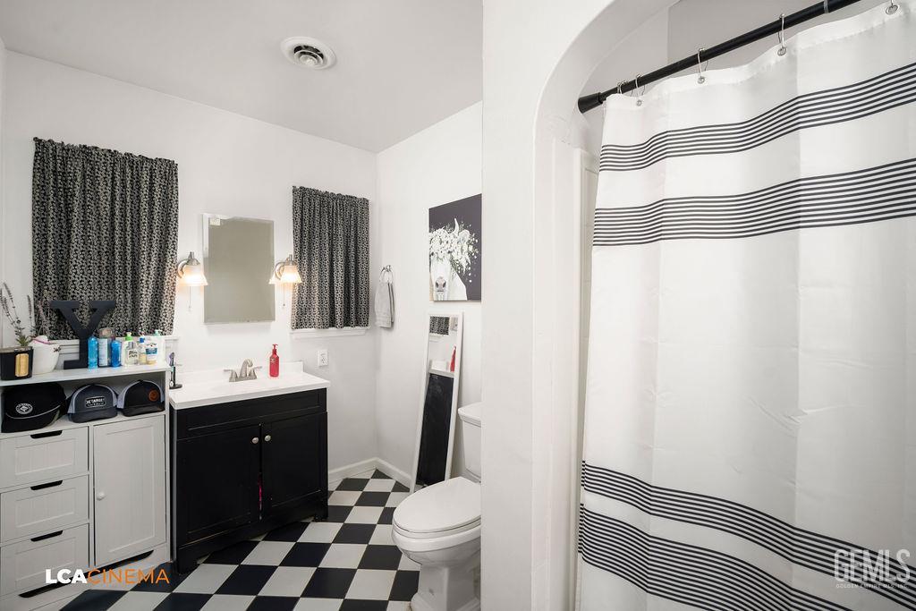 Undisclosed Address Shafter, CA 93263 - Photo 11 of 21 a bathroom with a sink toilet and shower