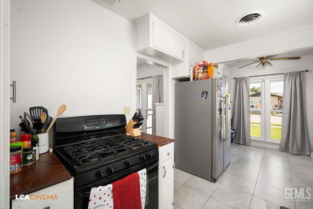 Undisclosed Address Shafter, CA 93263 - Photo 14 of 21 a kitchen with stainless steel appliances granite countertop a refrigerator and a stove