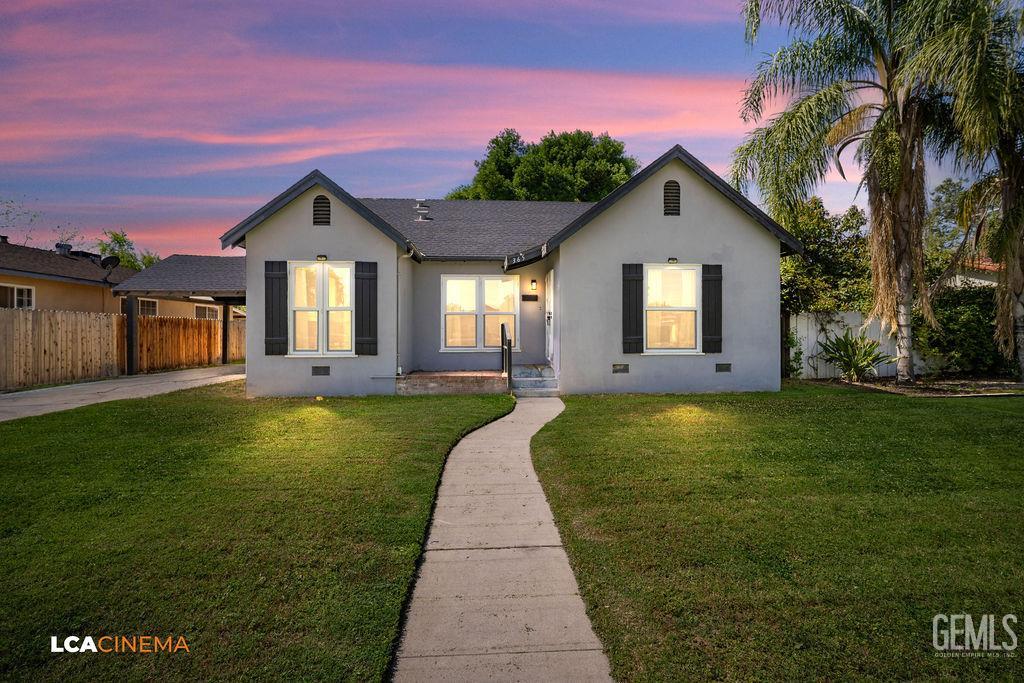 Undisclosed Address Shafter, CA 93263 - Photo 2 of 21 a front view of a house with garden