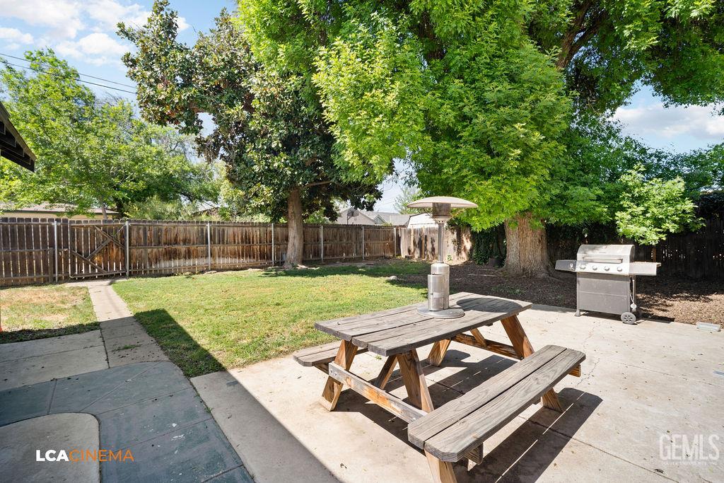 Undisclosed Address Shafter, CA 93263 - Photo 21 of 21 a view of a backyard with swimming pool and sitting area