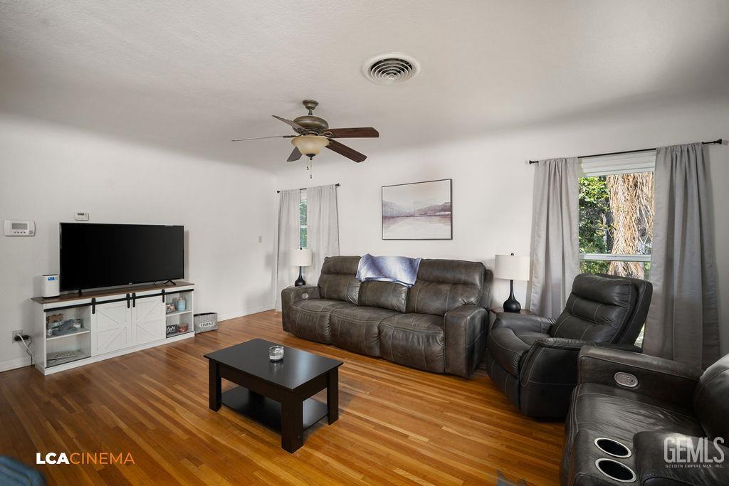 Undisclosed Address Shafter, CA 93263 - Photo 8 of 21 a living room with furniture and a flat screen tv