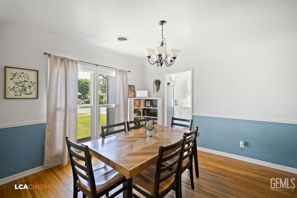 Undisclosed Address Shafter, CA 93263 - Photo 9 of 21 a view of a dining room with furniture and window