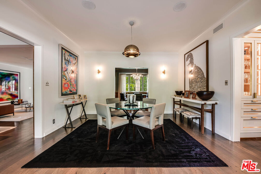 9551 Lime Orchard Road Beverly Hills, CA 90210 - Photo 12 of 27 a workspace with wooden floor and windows