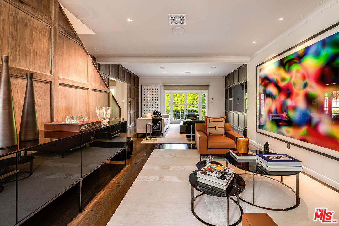 9551 Lime Orchard Road Beverly Hills, CA 90210 - Photo 14 of 27 a room with furniture pool table flat screen tv and windows