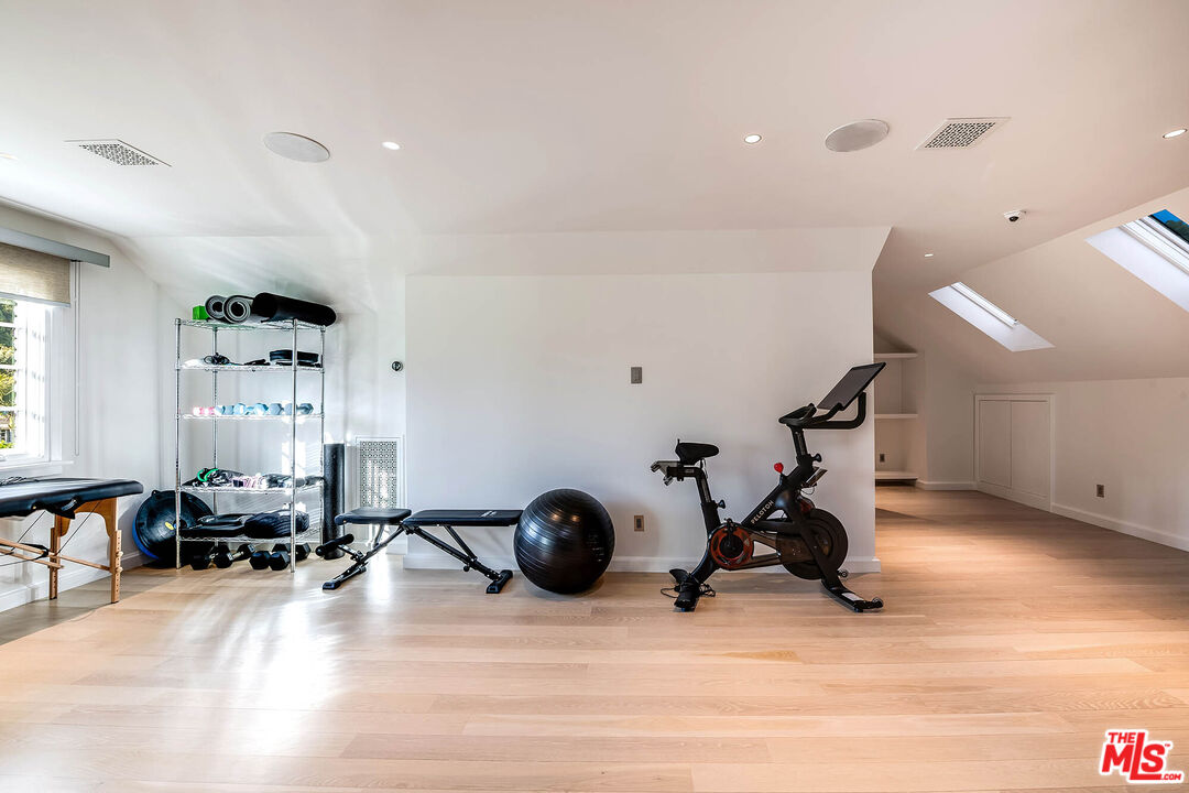 9551 Lime Orchard Road Beverly Hills, CA 90210 - Photo 26 of 27 a view of a room with gym equipment