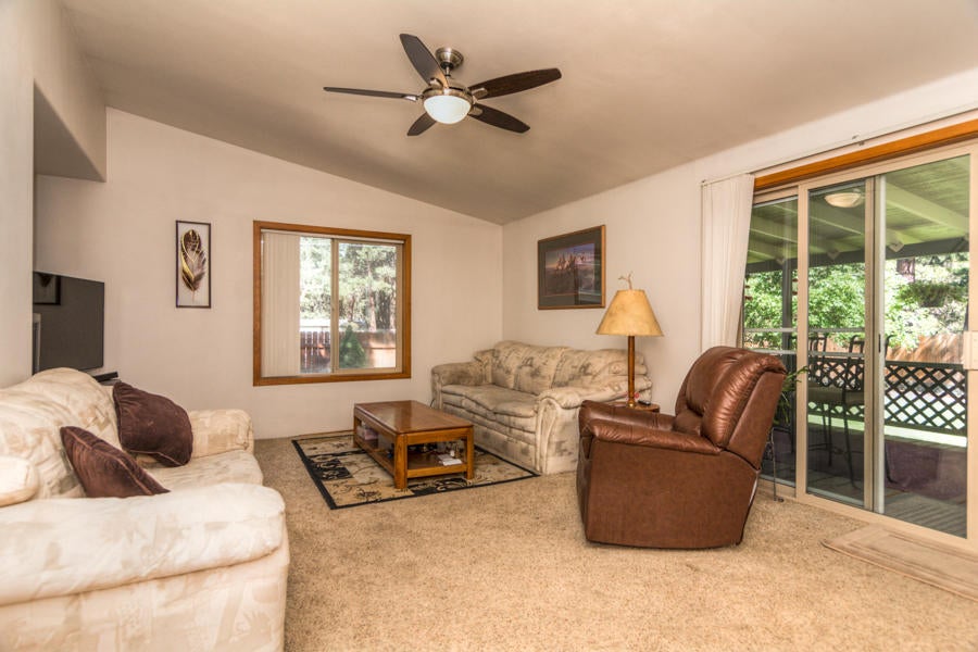 19116 Kiowa Road Bend, OR 97702 - Photo 22 of 38 Great/family room off of kitchen with sliding doors to back deck.