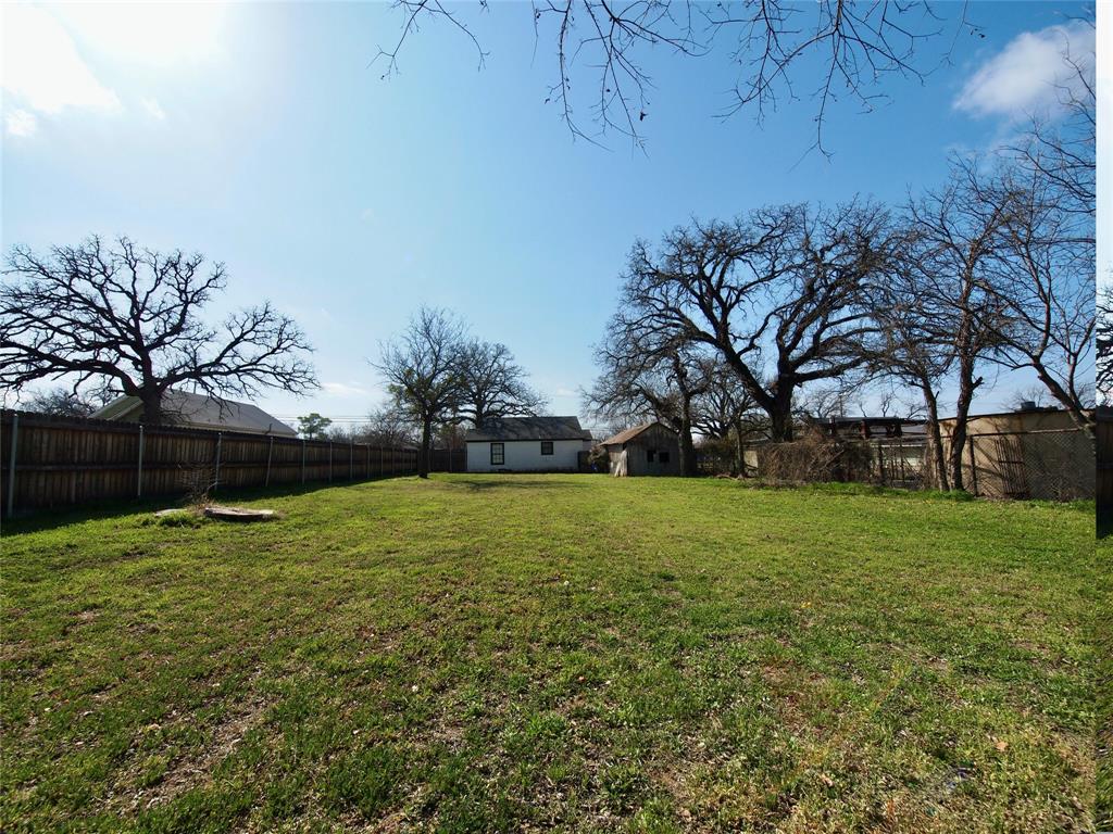 1327 Old Jacksboro Road Graham, TX 76450 - Photo 25 of 33 a view of a field of grass and trees