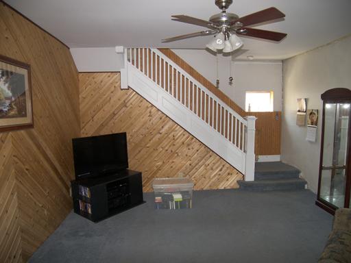860 Walnut Road LaSalle, IL 61301 - Photo 4 of 8 a living room with furniture and a flat screen tv