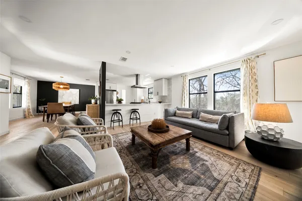 a living room with furniture and a couch