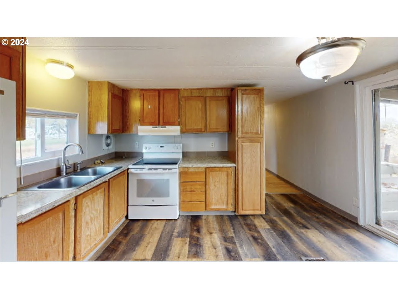 80978 Division Road Irrigon, OR 97844 - Photo 2 of 7 a upper view of a kitchen with a sink and cabinets