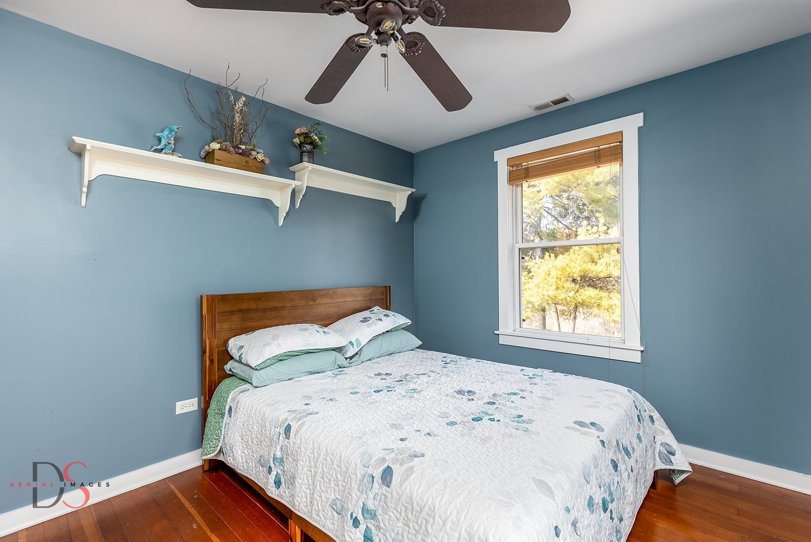 10978 A Crimmin Road Newark, IL 60541 - Photo 17 of 24 a bedroom with a bed and a window