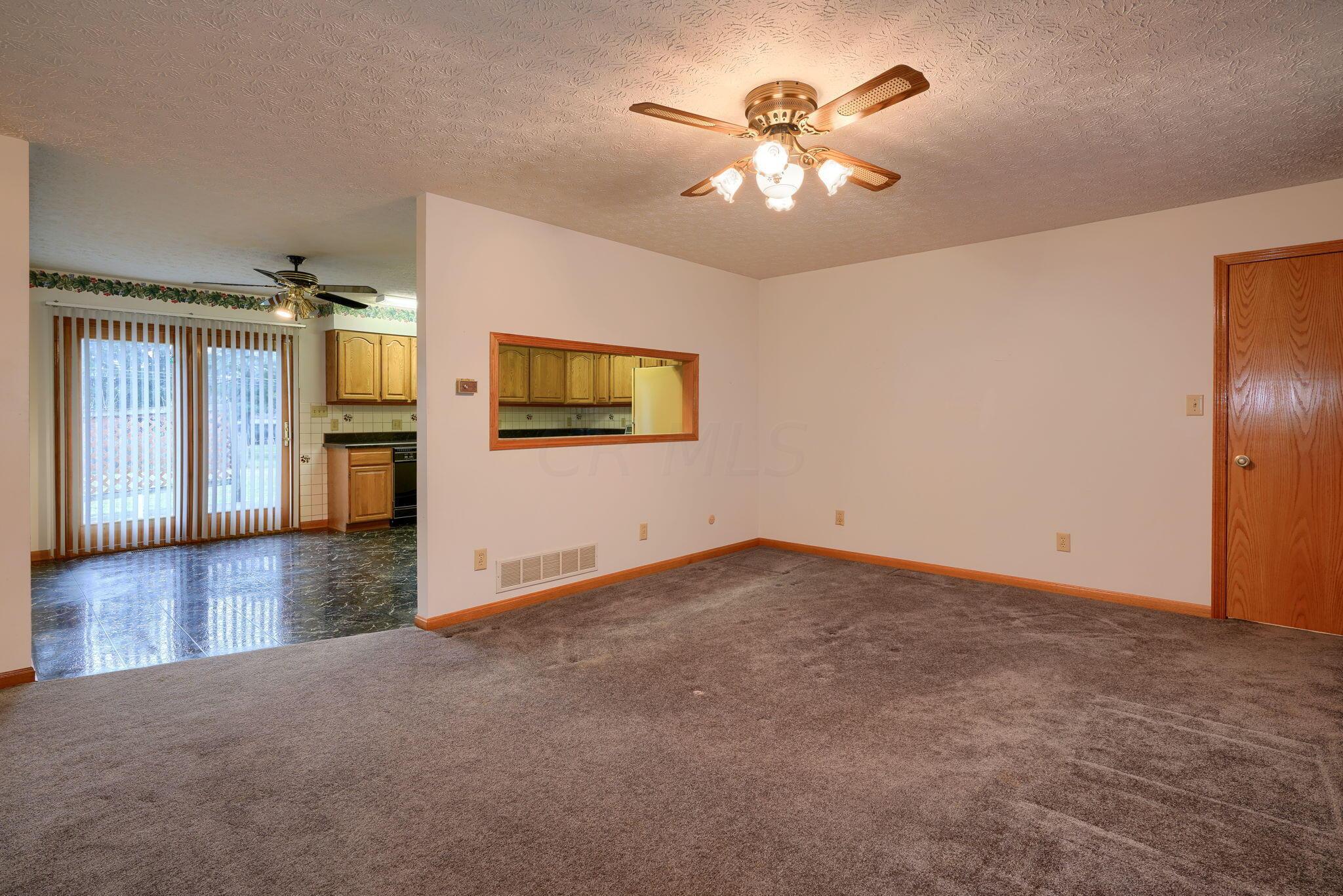 191 Rockwell Road Columbus, OH 43207 - Photo 10 of 28 View from formal living room to dining area and kitchen.