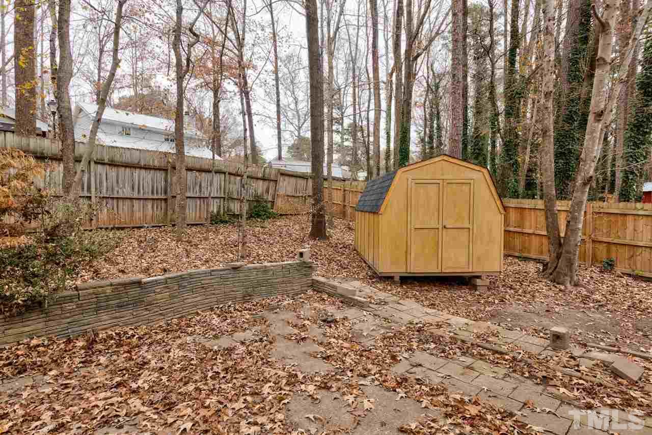 7300 Post Oak Road Raleigh, NC 27615 - Photo 26 of 30 a view of a backyard