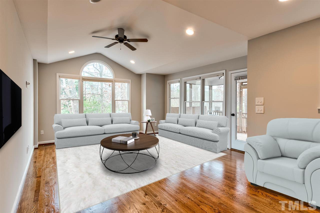 7300 Post Oak Road Raleigh, NC 27615 - Photo 7 of 30 a living room with furniture and a large window