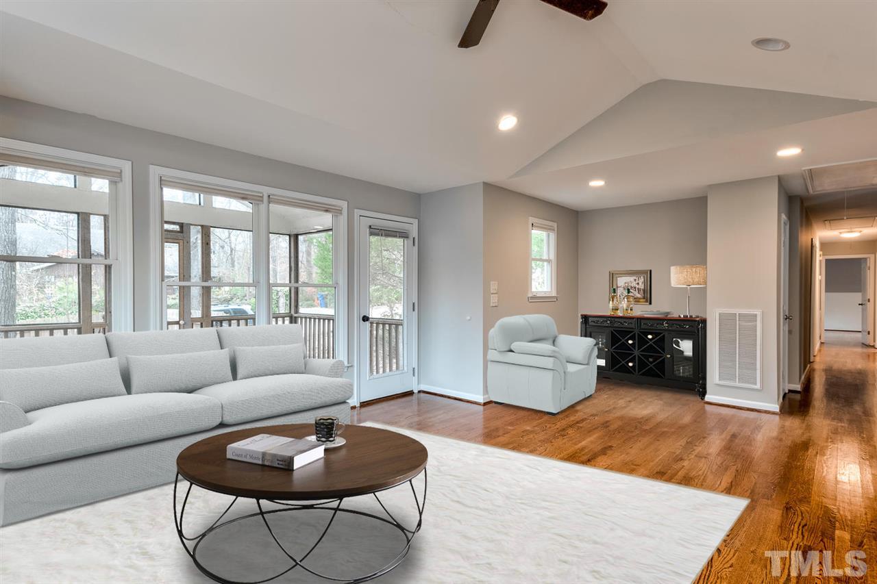 7300 Post Oak Road Raleigh, NC 27615 - Photo 8 of 30 a living room with furniture and a wooden floor