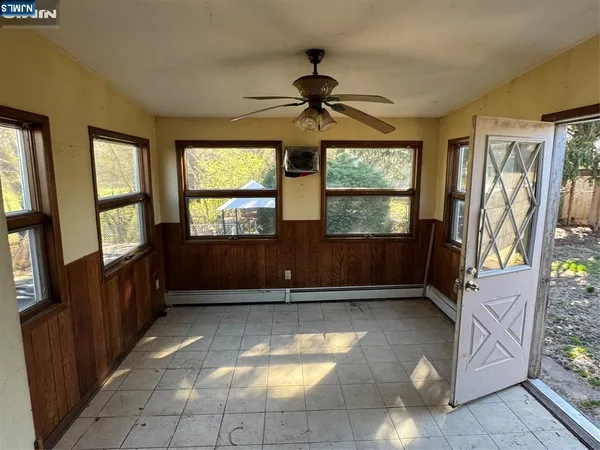 a view of entryway with a front door