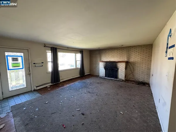an empty room with windows