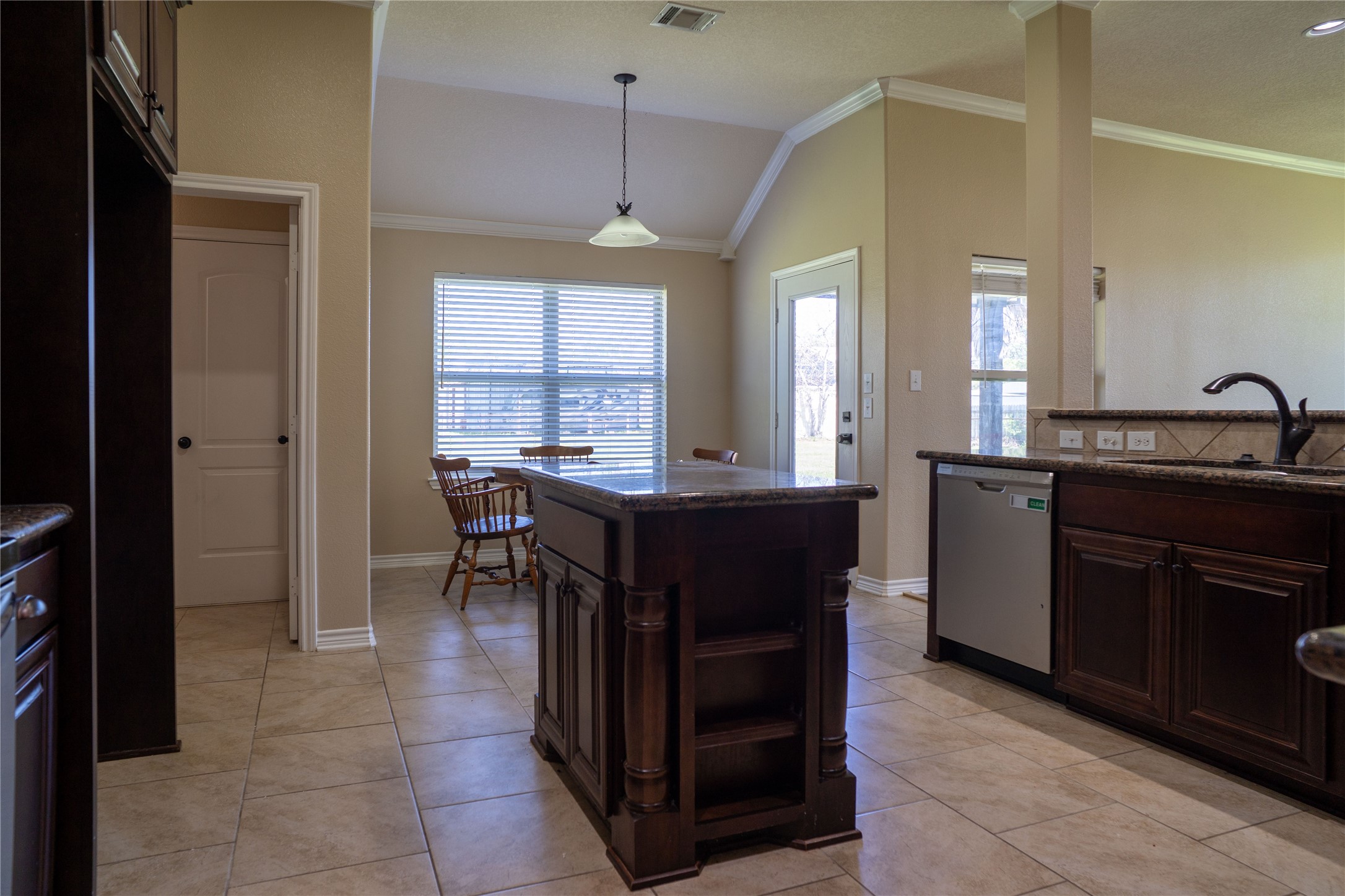 119 Hackberry Street Louise, TX 77455 - Photo 11 of 31 a kitchen with a table and chairs in it