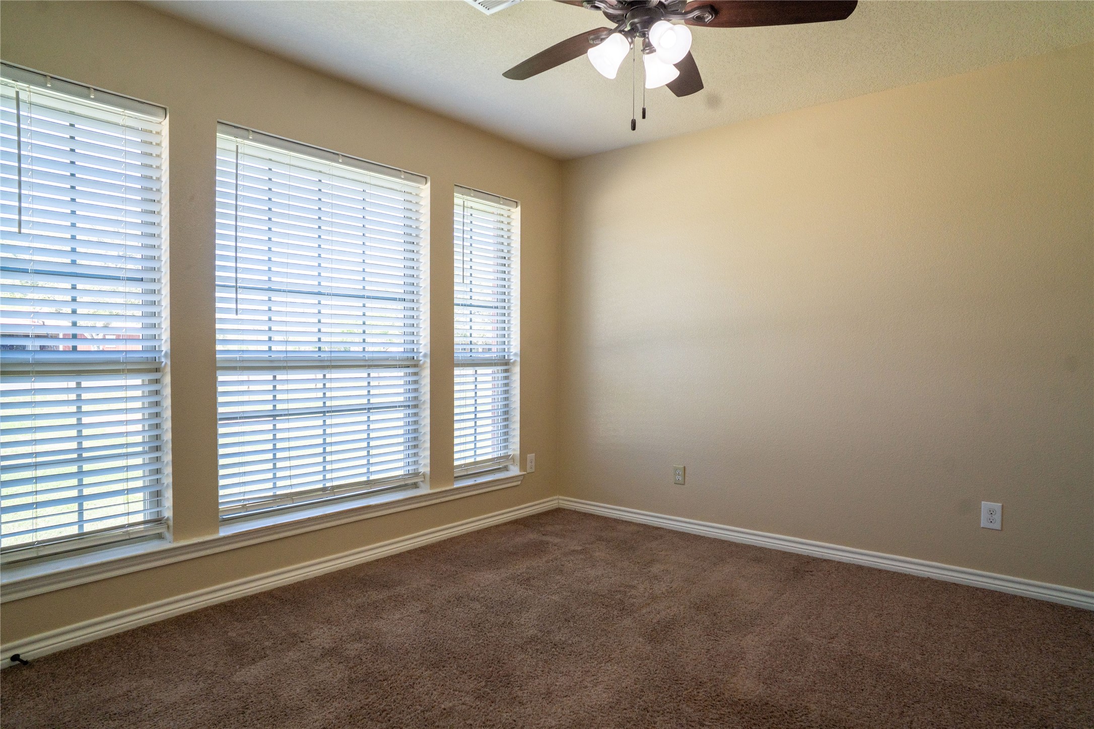 119 Hackberry Street Louise, TX 77455 - Photo 24 of 31 an empty room with a window