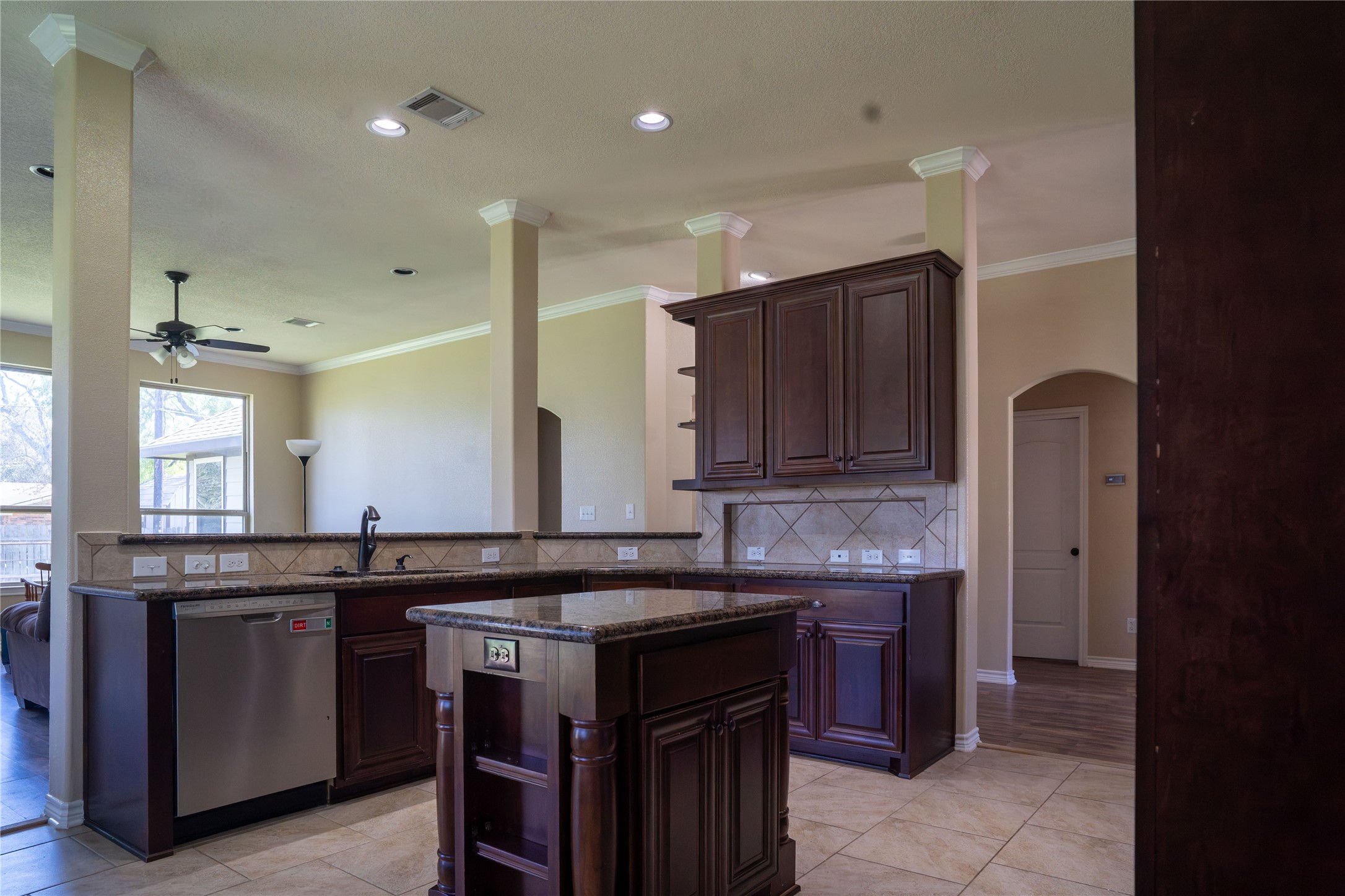 119 Hackberry Street Louise, TX 77455 - Photo 10 of 31 a kitchen with a sink and a refrigerator