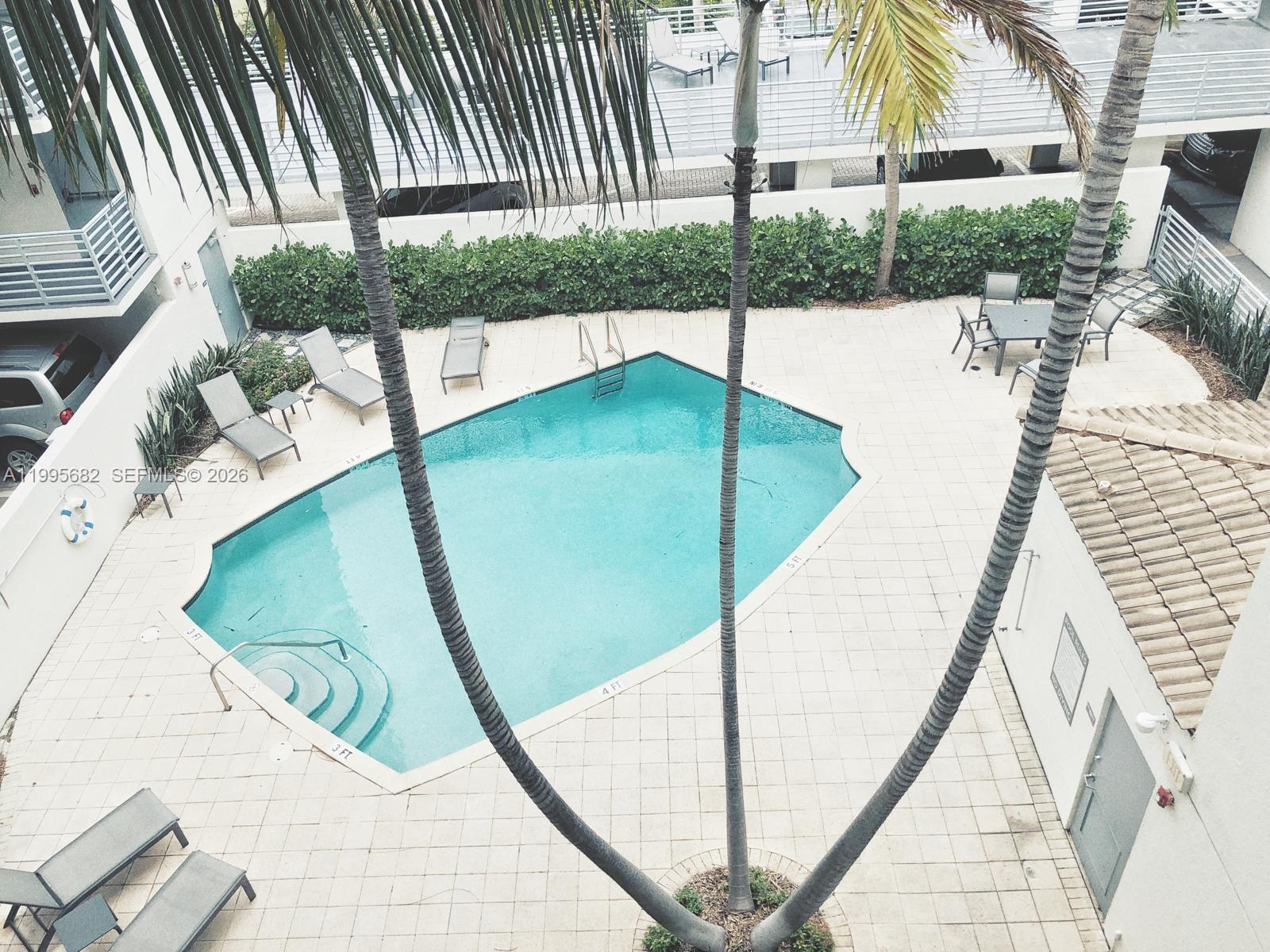 1401 Bay Road, Unit 412 Miami Beach, FL 33139 - Photo 2 of 9 a view of balcony with furniture