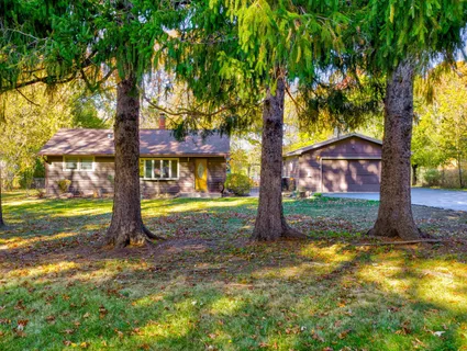 a view of a house with garden