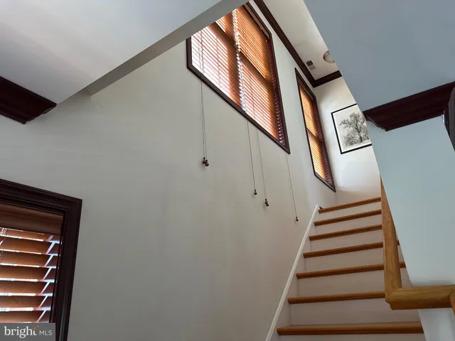 a view of a chair and table in the balcony