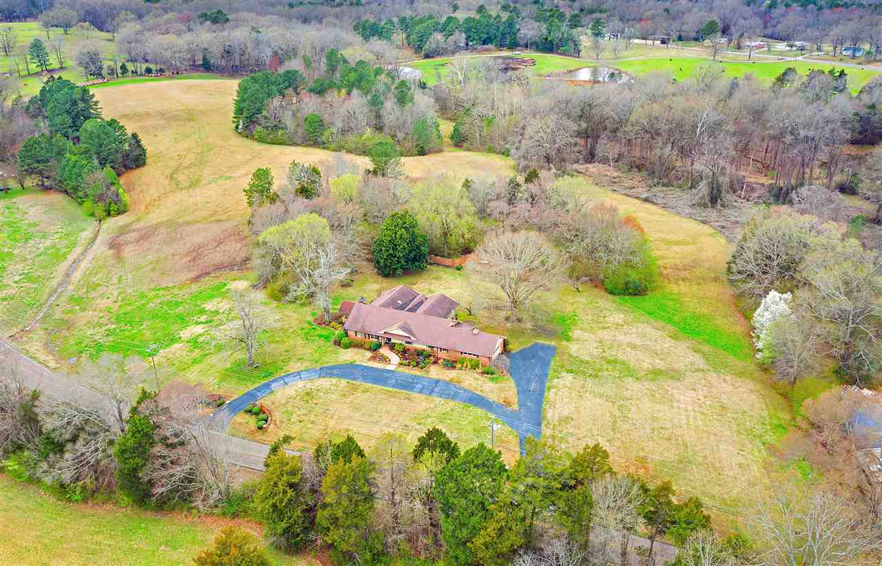 1519 Riverside Drive Jackson, TN 38301 - Photo 1 of 1 a view of a swimming pool with a yard