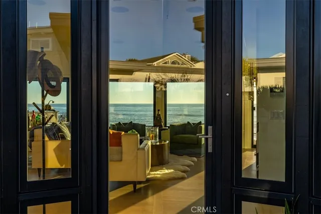 a bedroom with a bed and a flat tv screen on the table