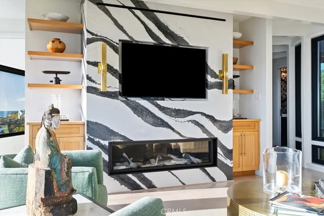 a view of room with painting on the wall