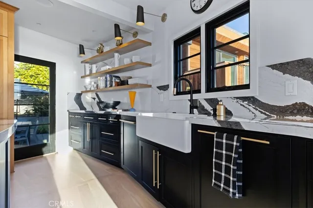 a view of a chairs and table in patio