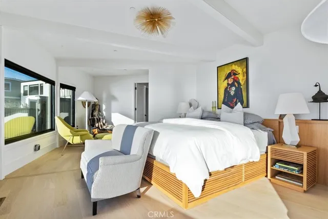 a view of a balcony with chair and wooden floor