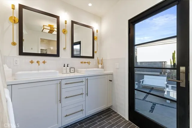 a view of backyard of house with seating space