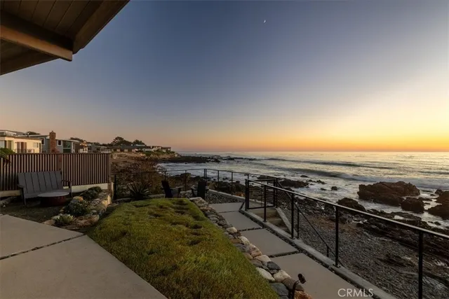 a dinning table and chairs in patio of the house