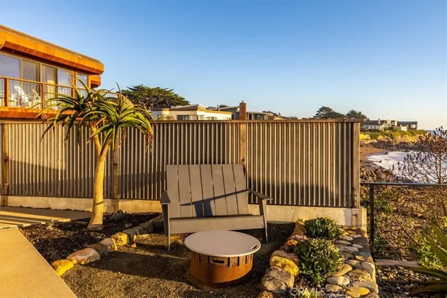 a bed room with a bed and a television